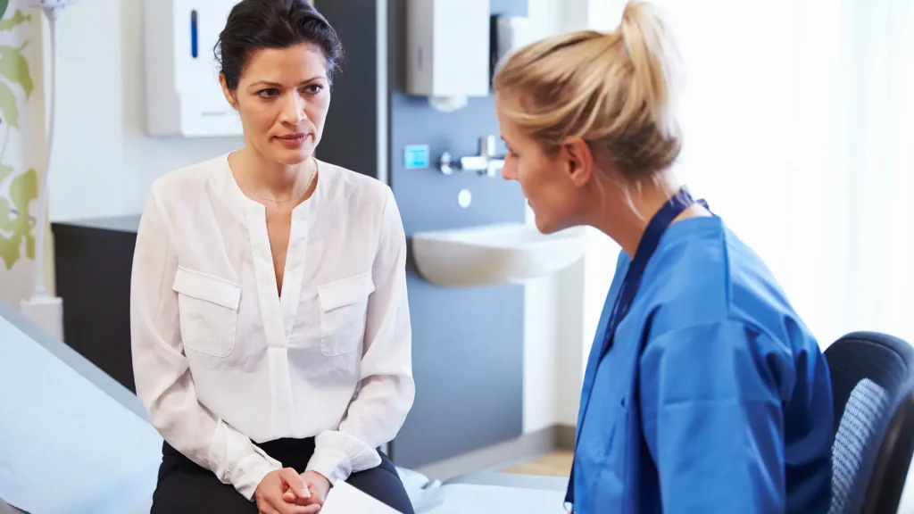 A doctor and female patient consultation.