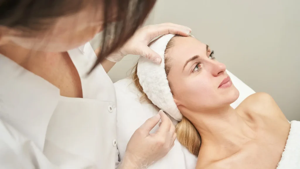 An individual undergoing a consultation with a medical professional.