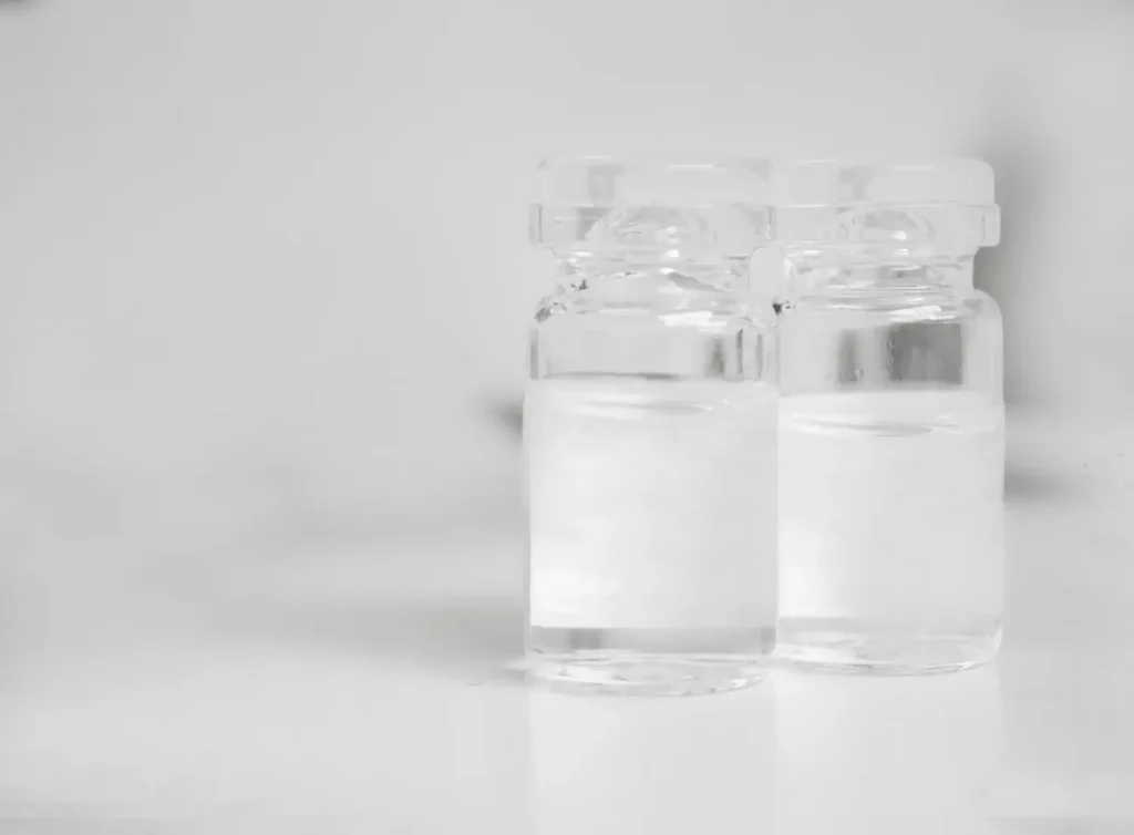 A close-up shot of the solution in small vials.