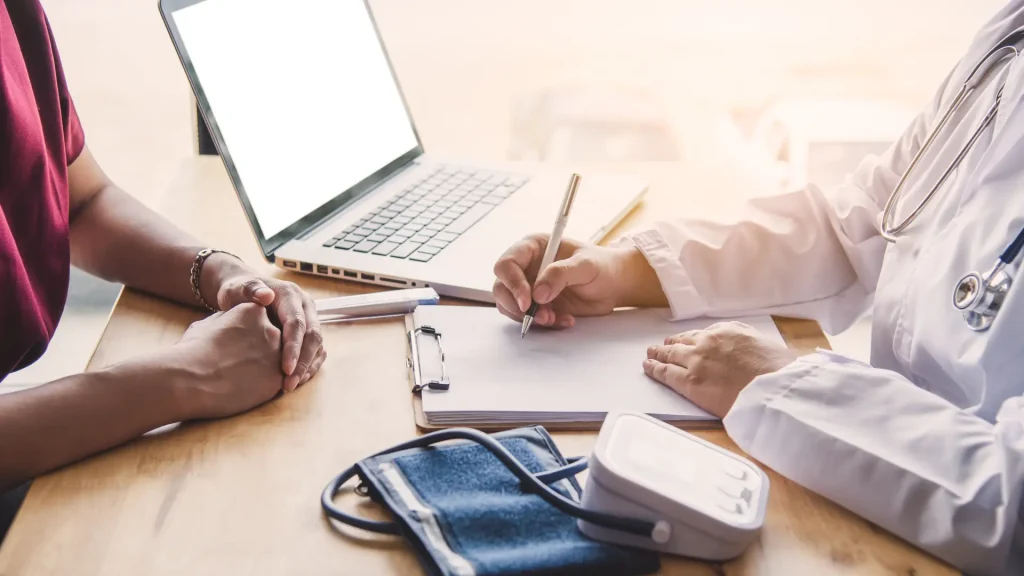 A patient and doctor consultation.