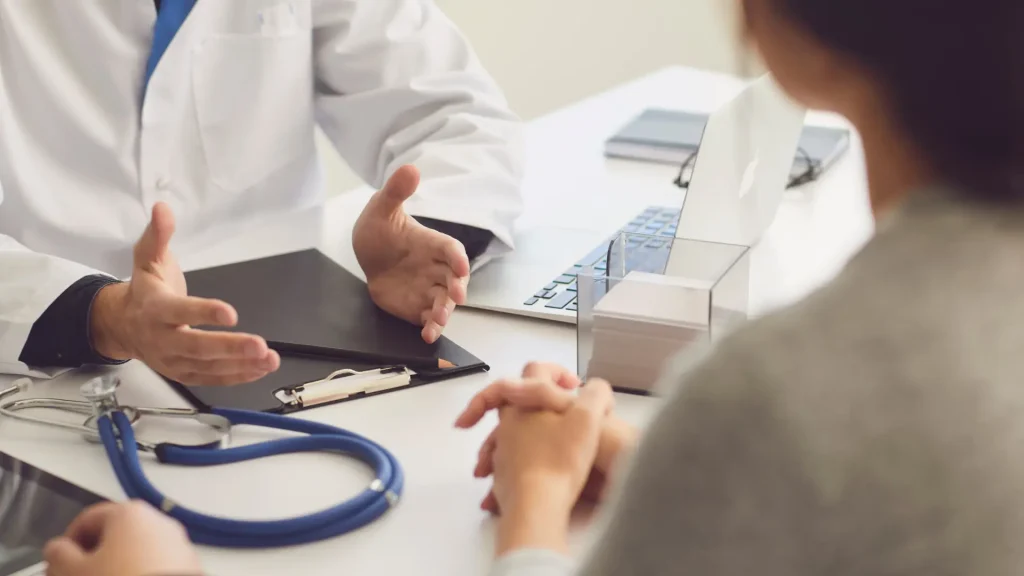 A doctor and patient consultation.