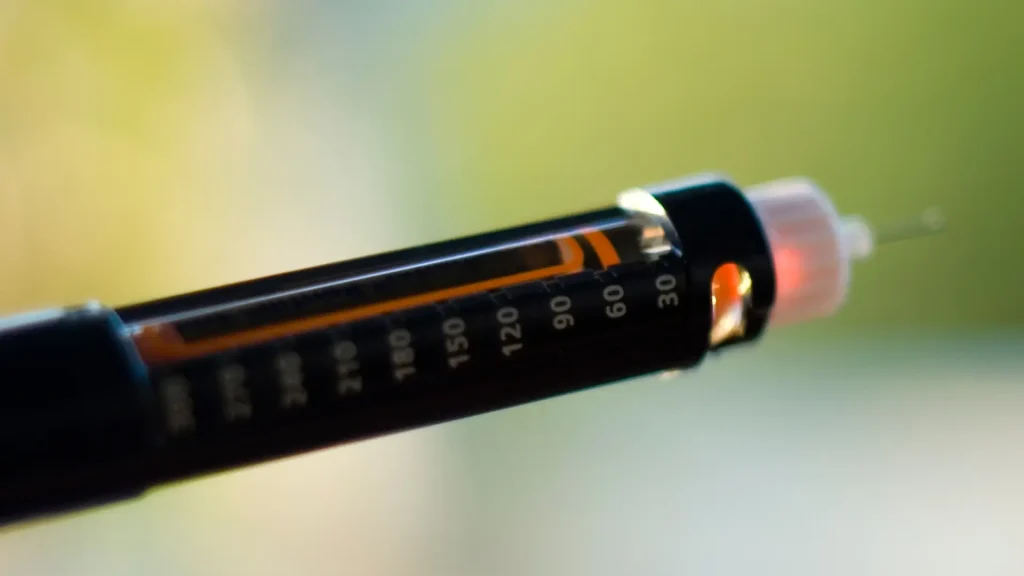 A close-up shot of an injection pen.