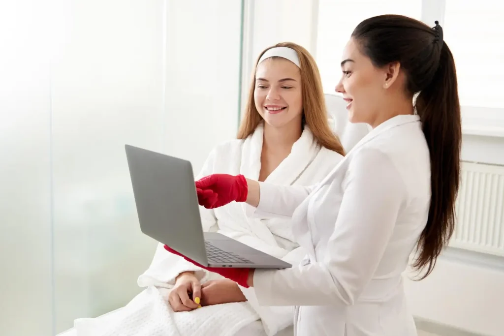 A doctor and patient happily conversing about the treatment.