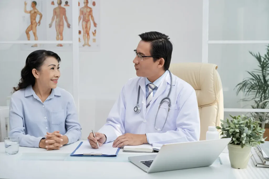 A doctor and patient treatment consultation.