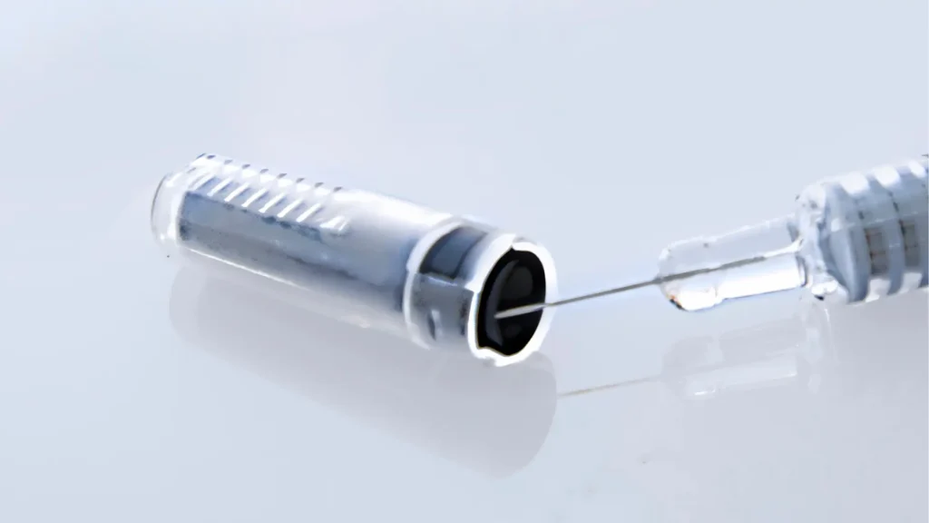 A close-up shot of a subcutaneous injection.