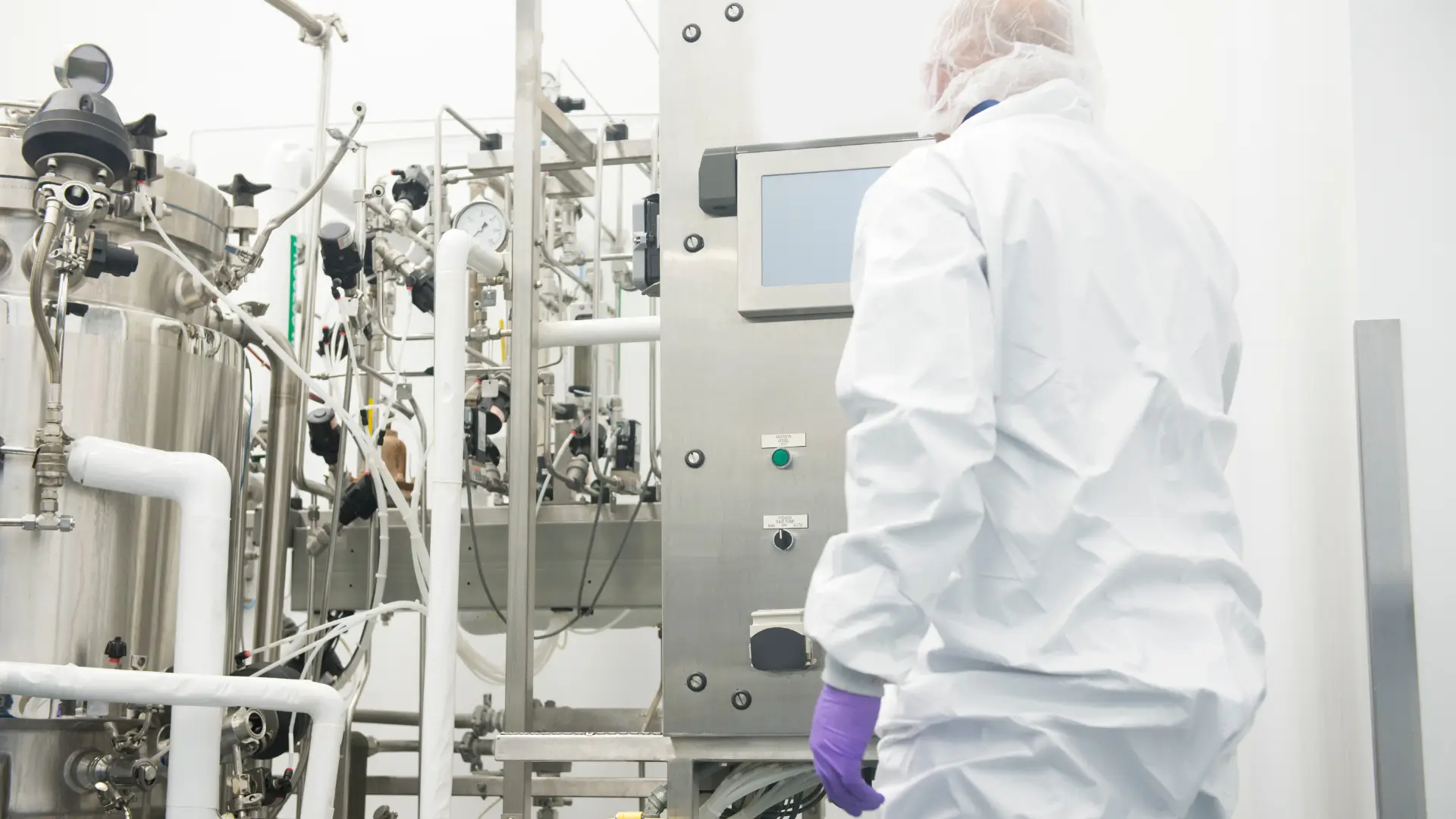 A scientist working in a pharmaceutical laboratory.