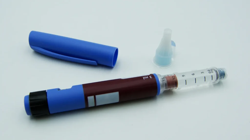 A close-up shot of an injector pen.