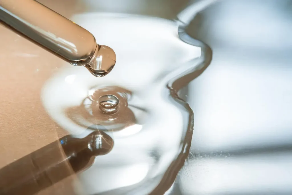 A close-up shot of a gel formulation on a surface.
