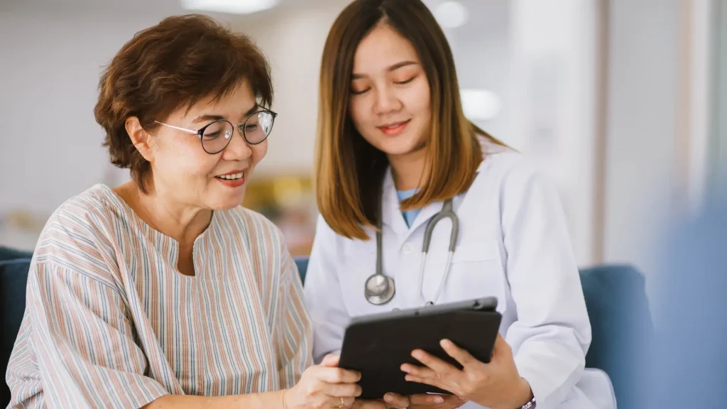 A patient having a consultation with their medical professional.