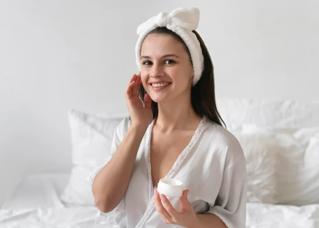 An individual doing their gentle skincare at home.