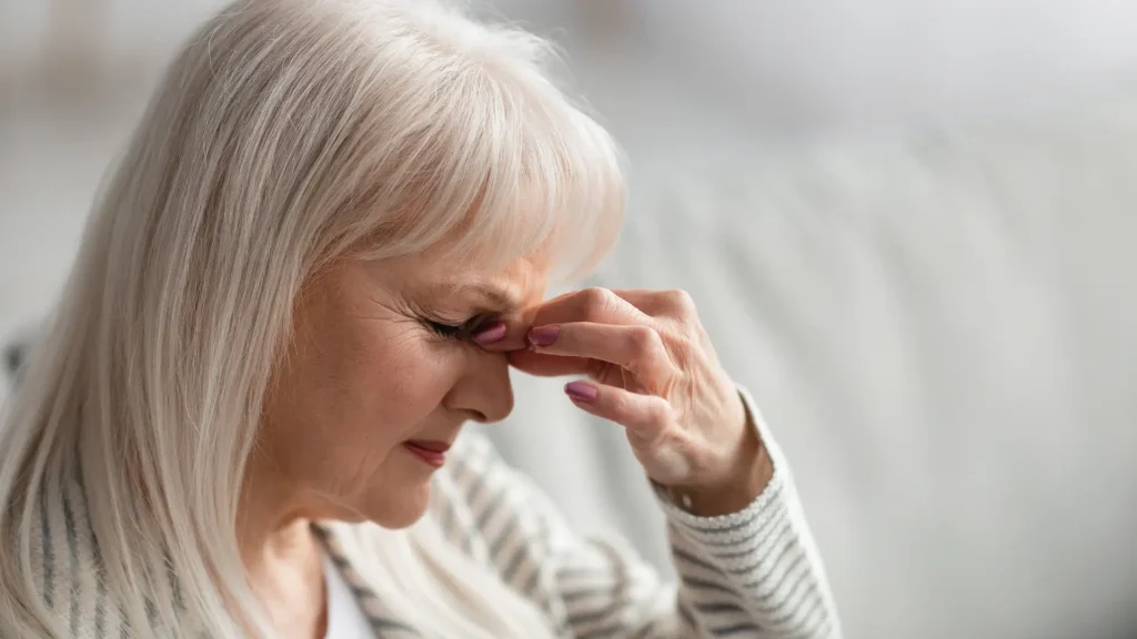 An individual dealing with headache.