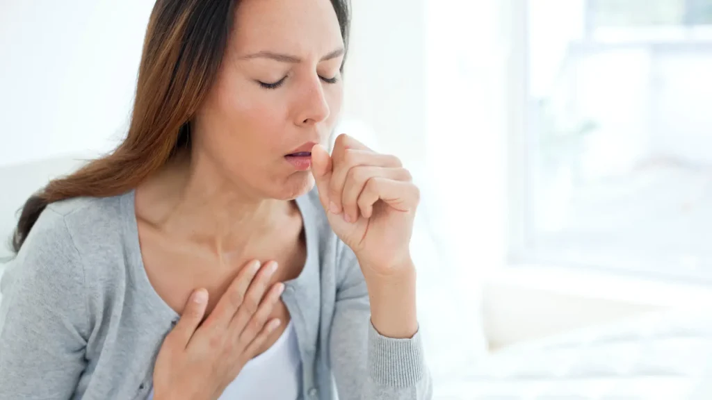 An individual coughing.