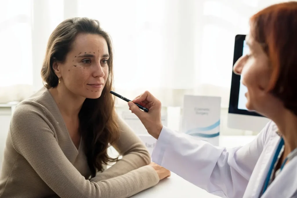 A practitioner discussing a patient's aesthetic treatment and goals.