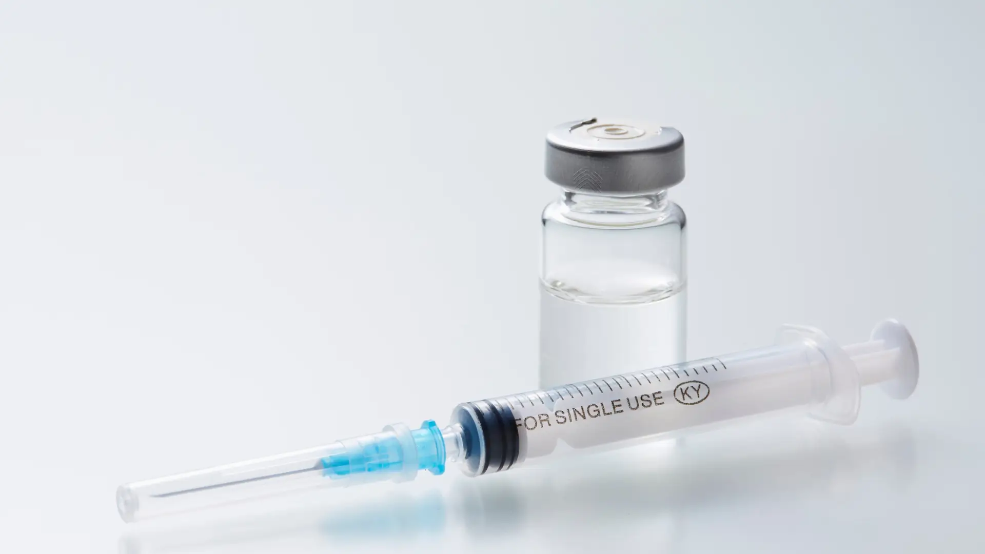 A syringe and vial solution.