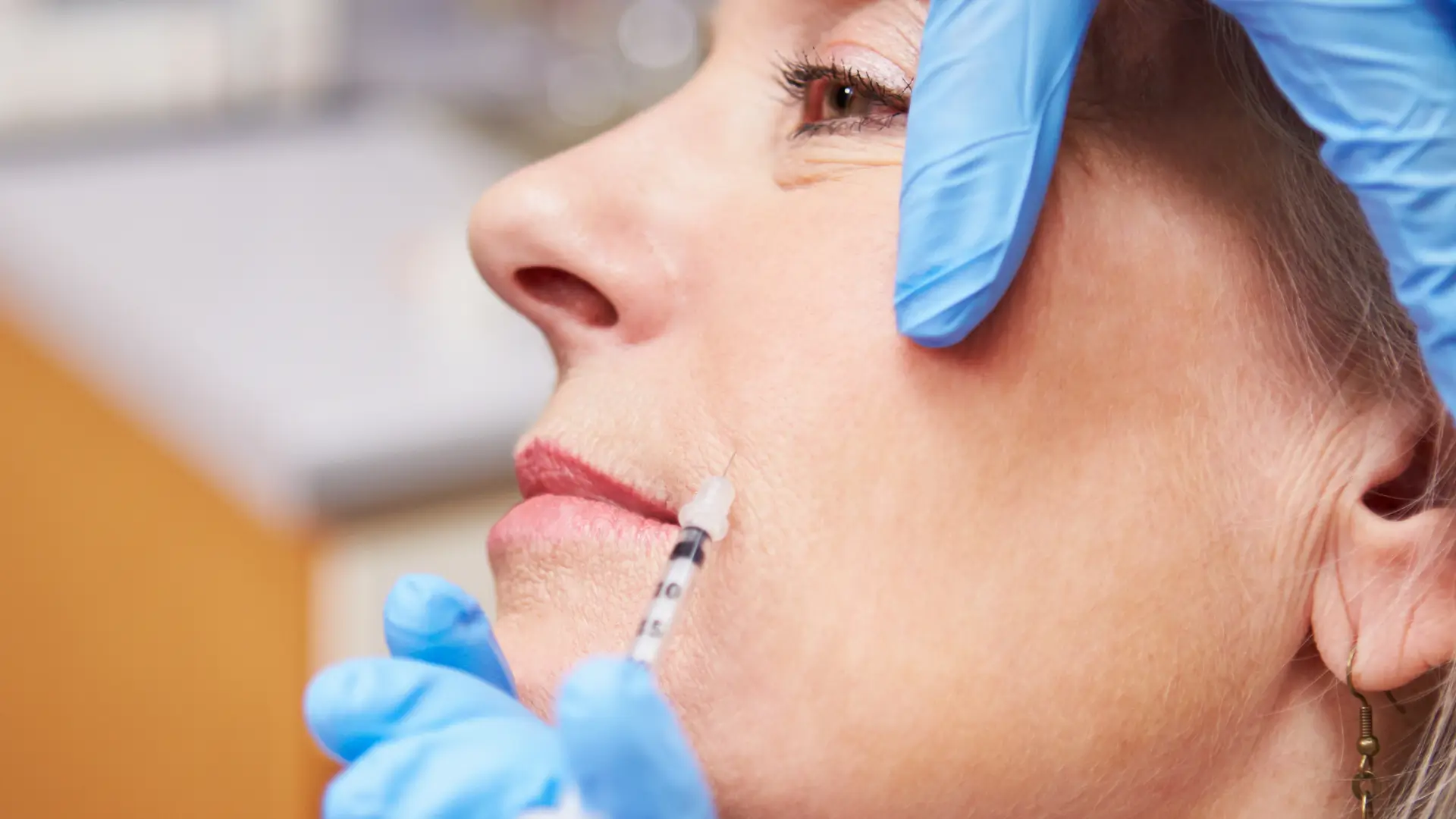A patient undergoing a botox injection treatment.