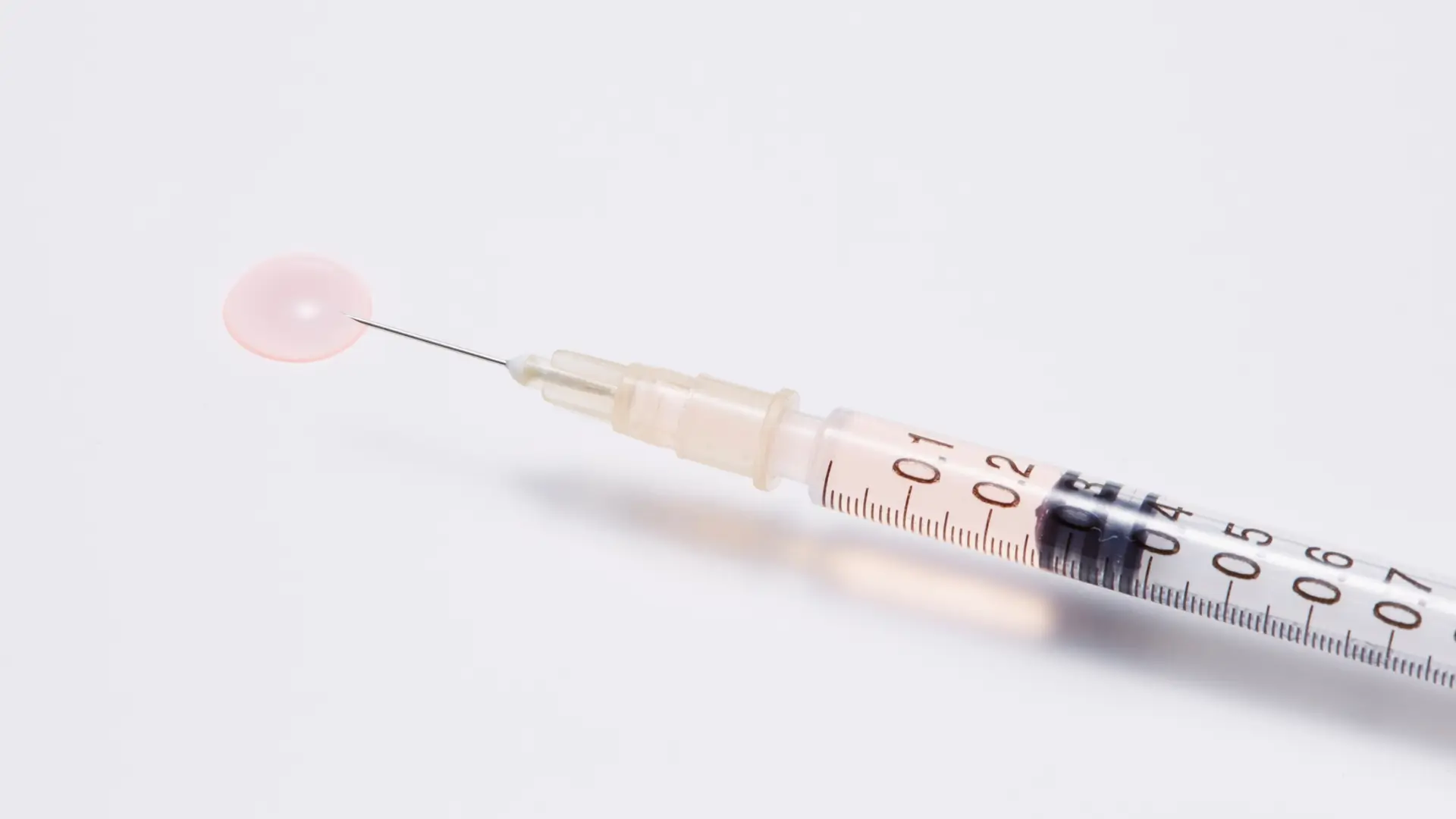A close-up shot of a botox injection and its dosage.