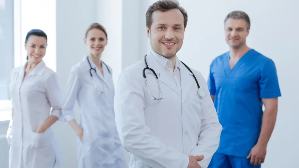 Medical practitioners posing for the camera.