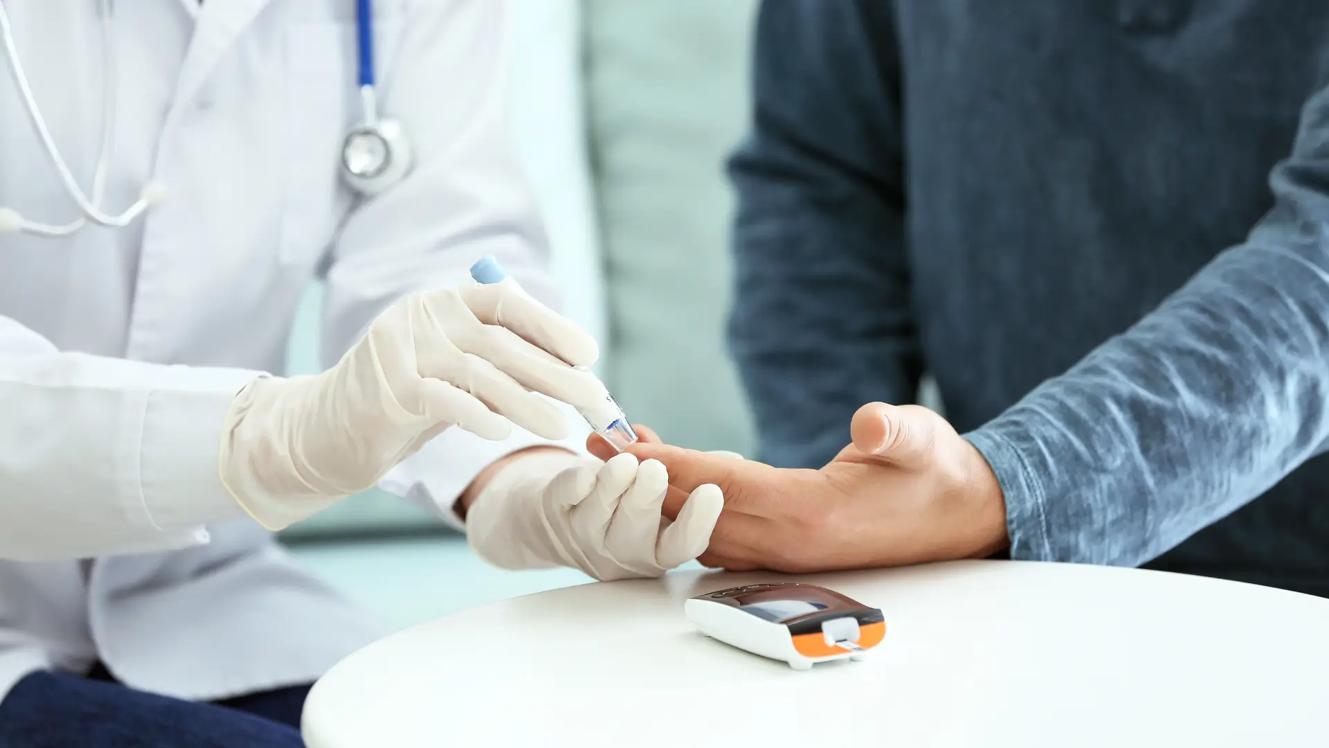 A medical professional checking a patient's blood sugar before prescribing a GLP-1 receptor or glycemic control management injection pen.