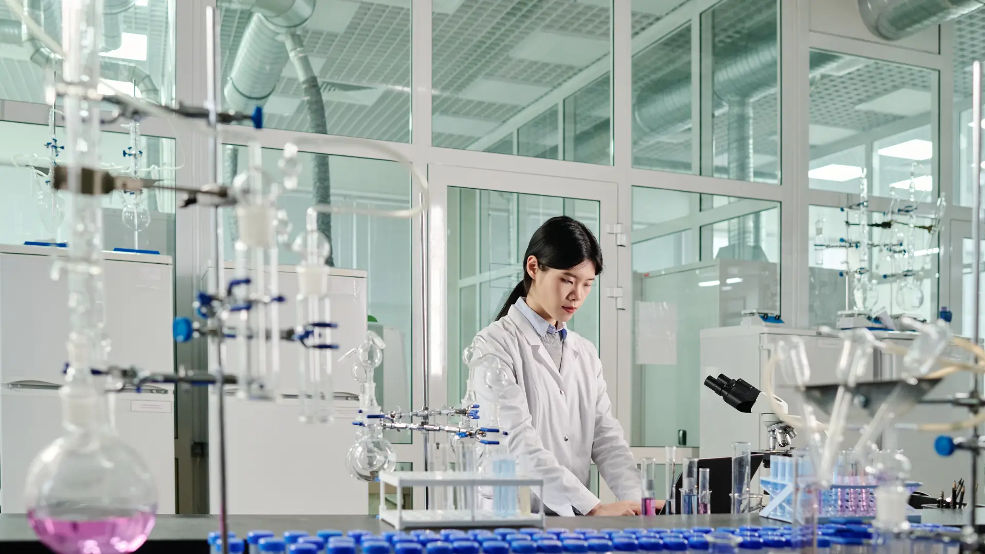 A medical scientist working in a laboratory during a drug's clinical trial.