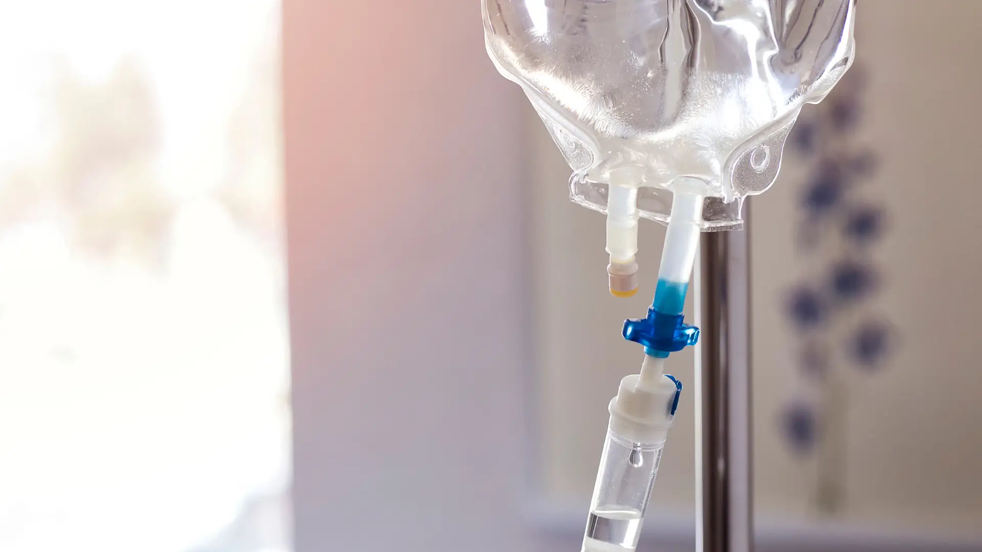 A close-up shot of an IV drip in a hospital room, similar to the infusion used in NAD IV therapy.