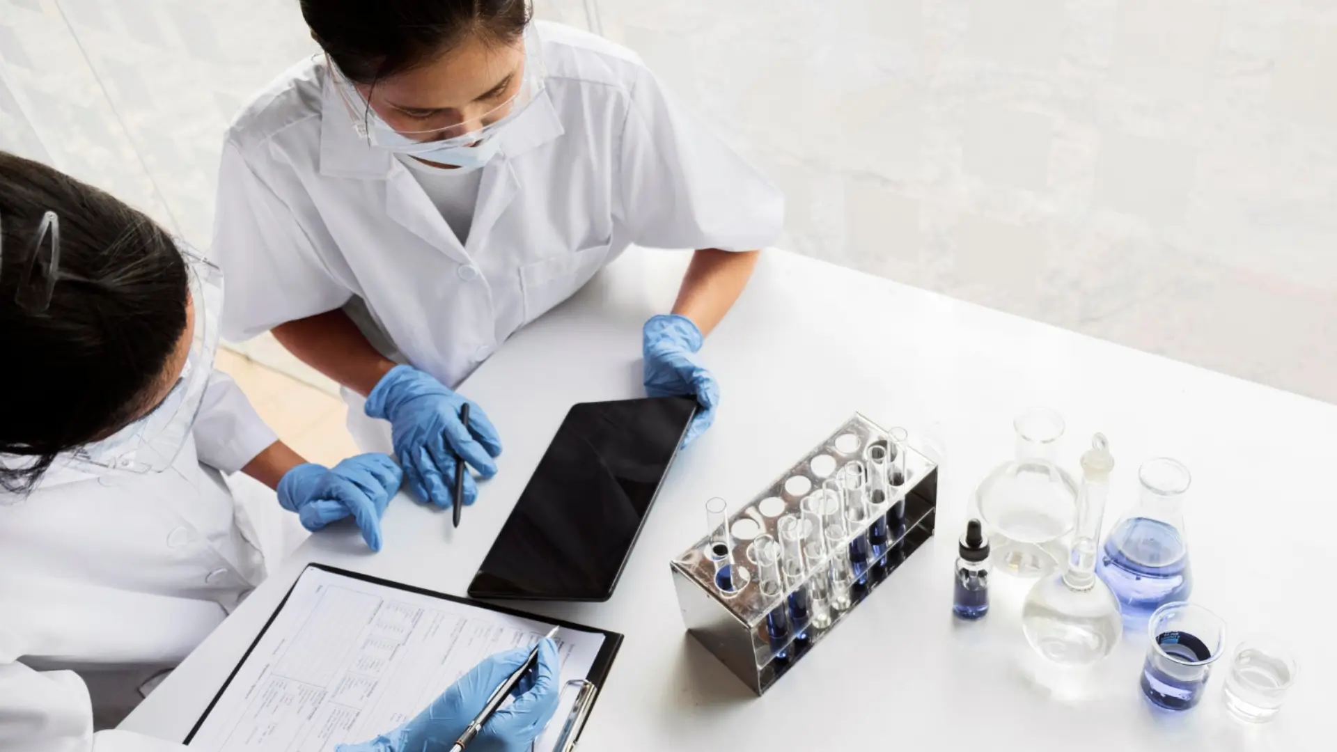 Medical scientists working on a laboratory to understand a drug's risk and benefits, like Ozempic.