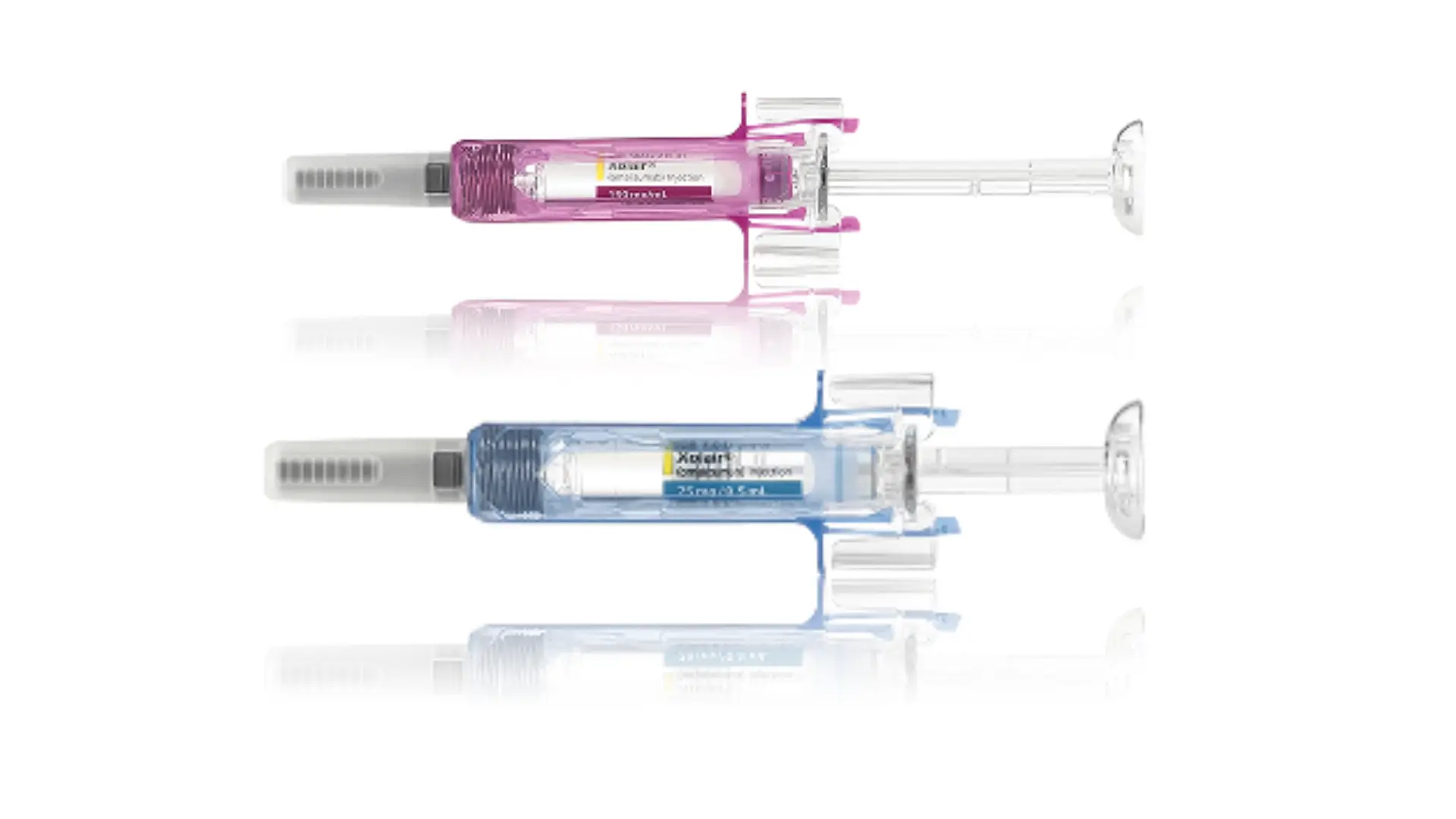 A close-up shot of Xolair injection pens with different doses.