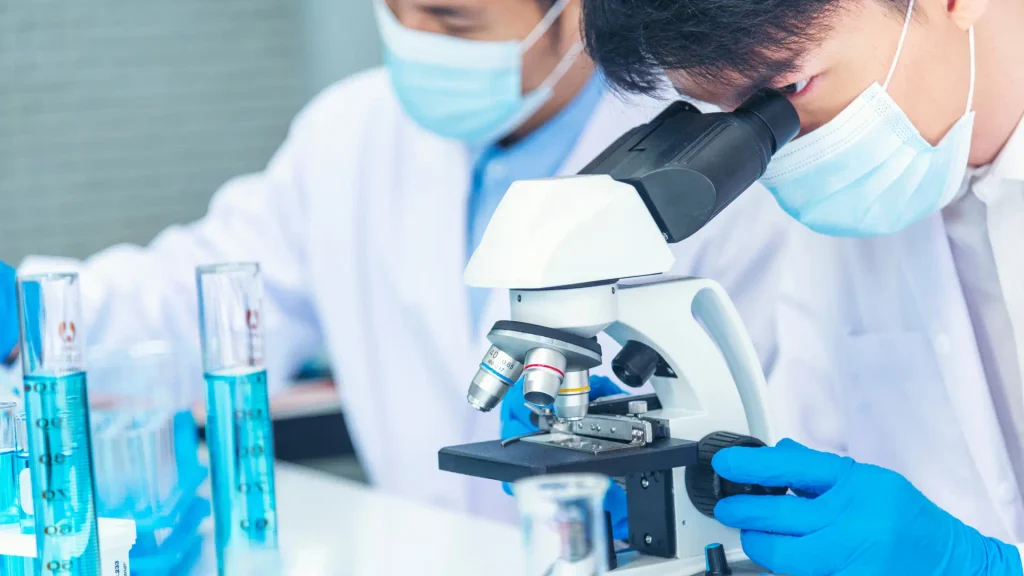 Research professionals reviewing an Ipamorelin vs Sermorelin peptide comparison for protocol planning.