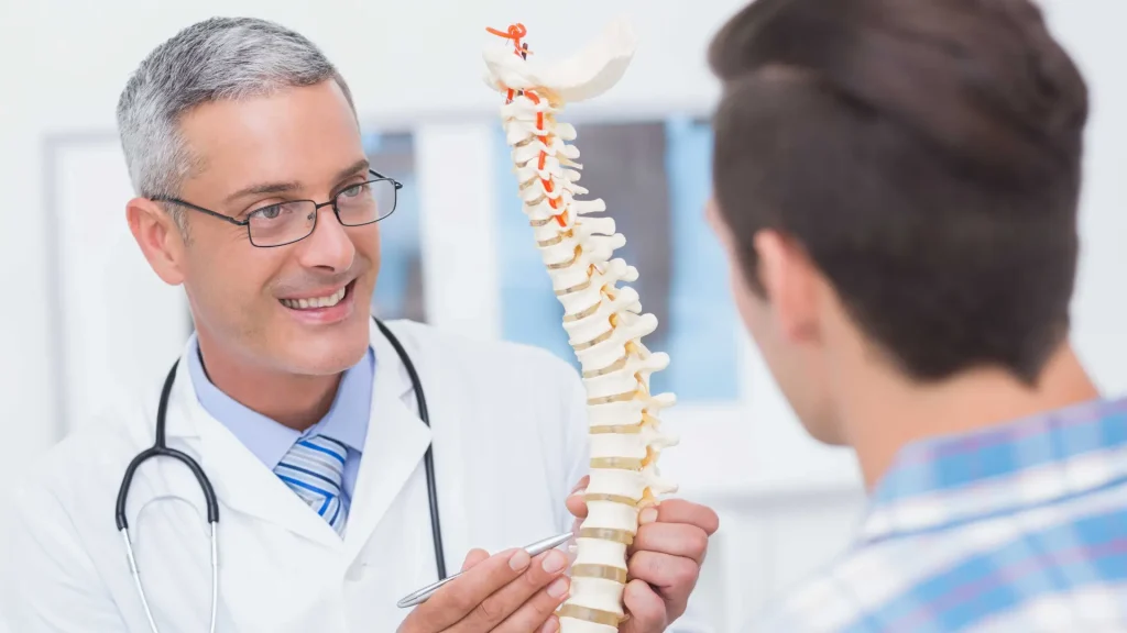 A medical professional explaining osteoporosis condition with a patient before prescribing an osteoporosis treatment.